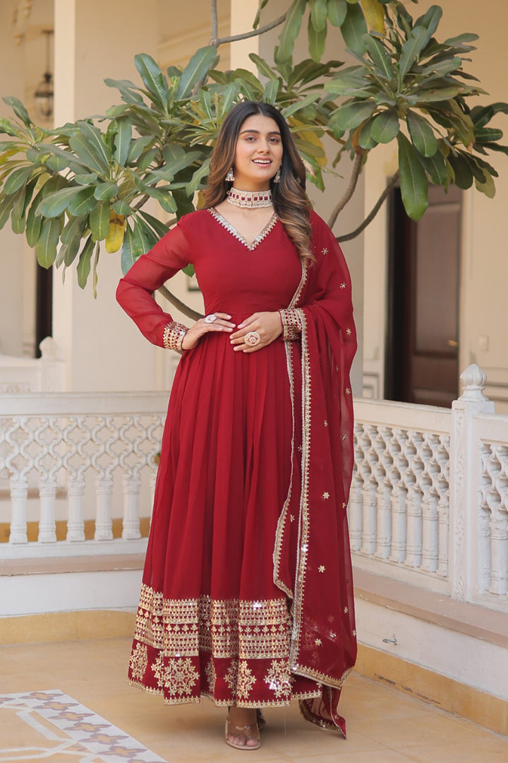 Maroon Faux Blooming Gown With Dupatta With Attractive Embroidery Sequence Work