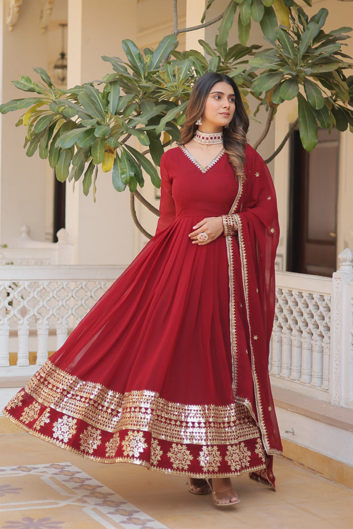 Maroon Faux Blooming Gown With Dupatta With Attractive Embroidery Sequence Work