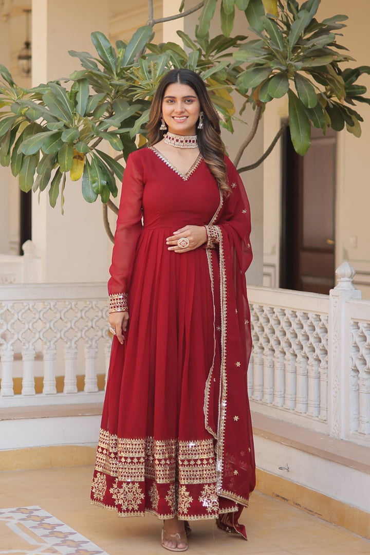 Maroon Faux Blooming Gown With Dupatta With Attractive Embroidery Sequence Work