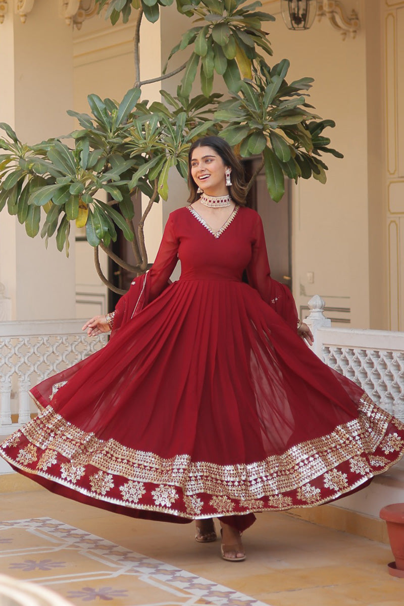 Maroon Faux Blooming Gown With Dupatta With Attractive Embroidery Sequence Work