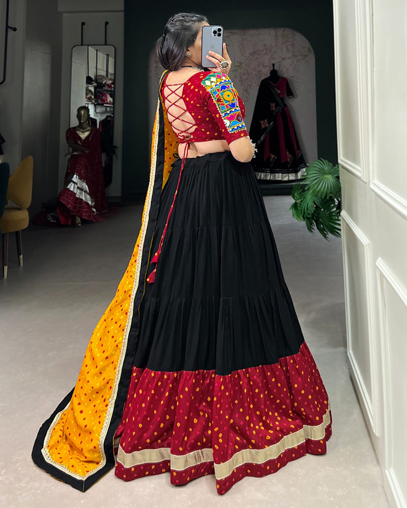 Navratri Wear Black Color Rayon And Dola Silk Ruffle Style Lehenga Choli