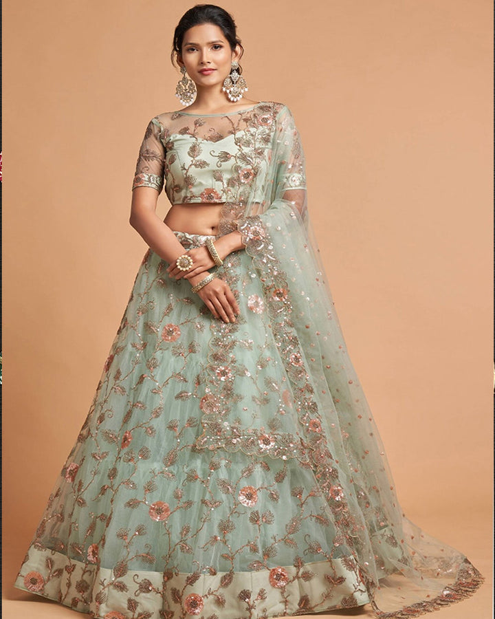 Latest Pista Green Soft Net Lehenga Choli