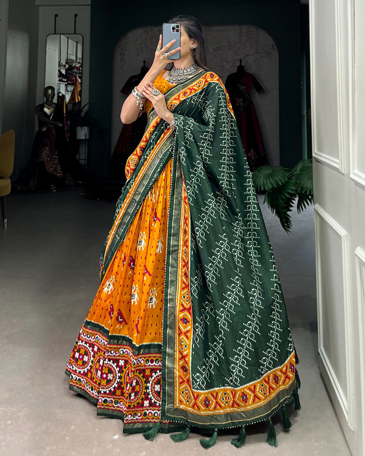 Patola Printed Mustard Color Tussar Silk Lehenga Choli