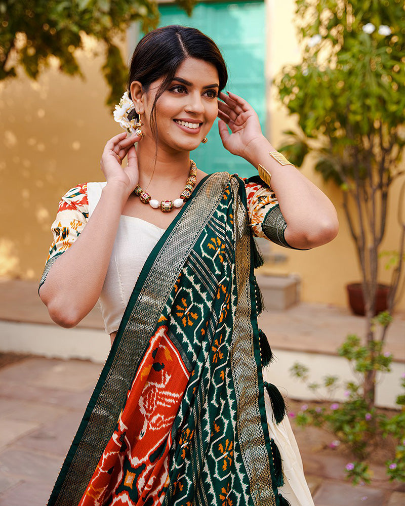 Amazing Orange Color Patola Printed Tussar Silk Lehenga Choli