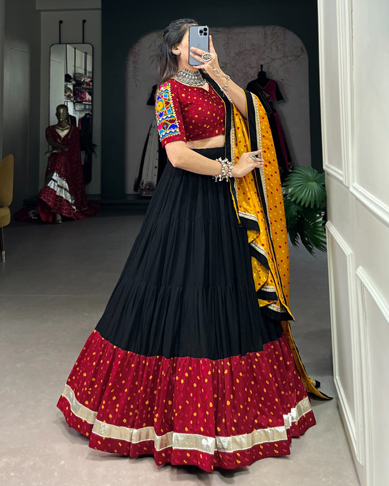 Navratri Wear Black Color Rayon And Dola Silk Ruffle Style Lehenga Choli