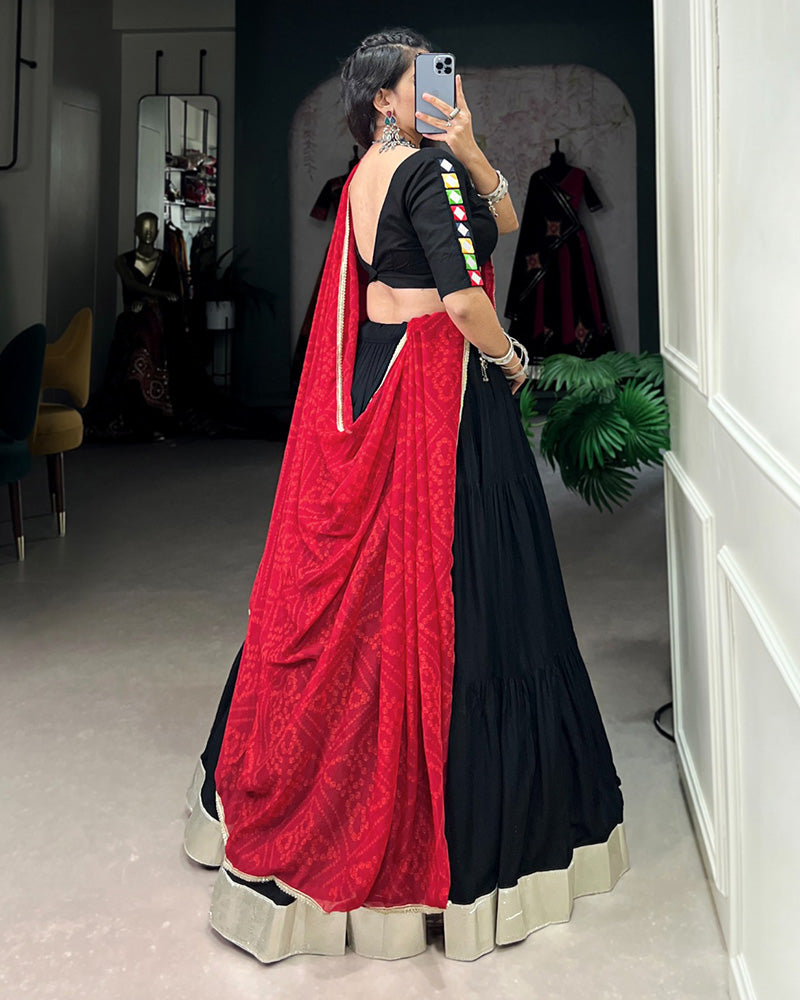 Navratri Wear Black Color Rayon Ruffle Style Lehenga Choli