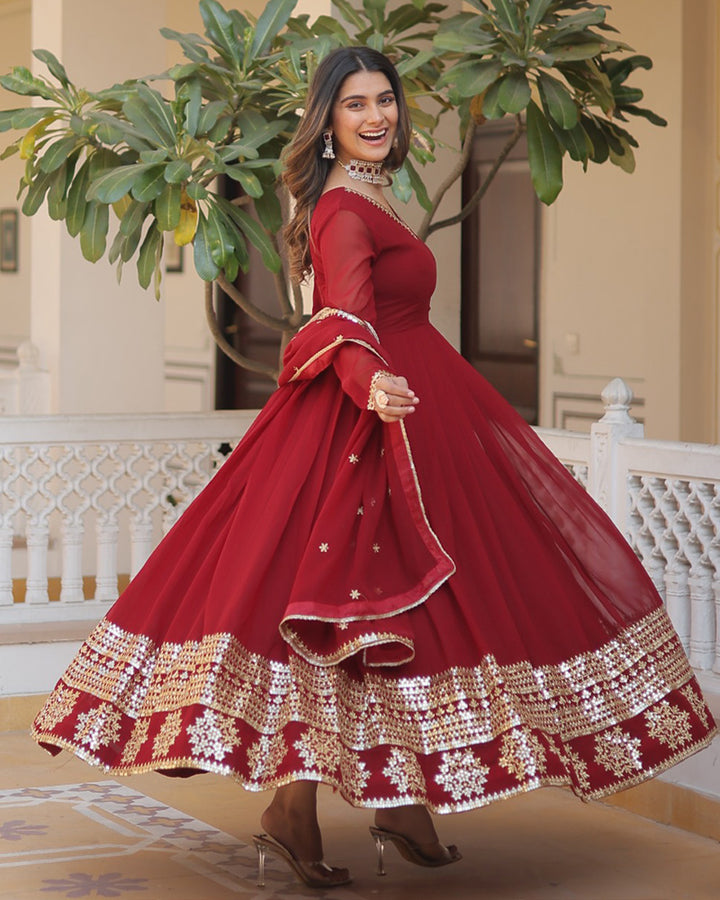 Maroon Faux Blooming Gown With Dupatta With Attractive Embroidery Sequence Work