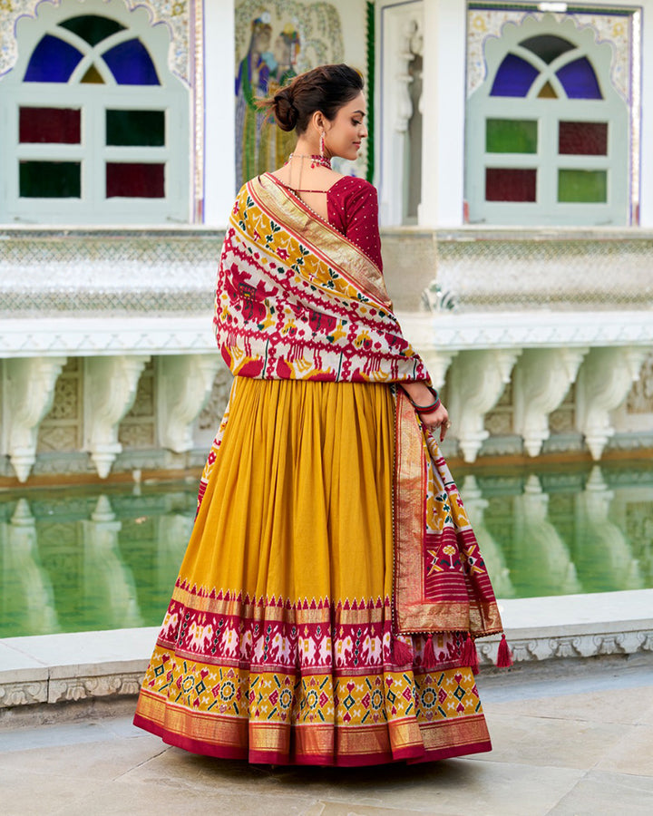 Patola Printed Mustard Color Tussar Silk Lehenga Choli