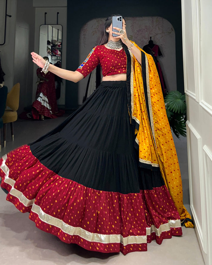 Navratri Wear Black Color Rayon And Dola Silk Ruffle Style Lehenga Choli