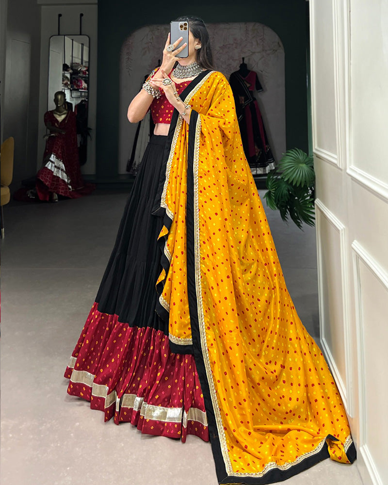 Navratri Wear Black Color Rayon And Dola Silk Ruffle Style Lehenga Choli