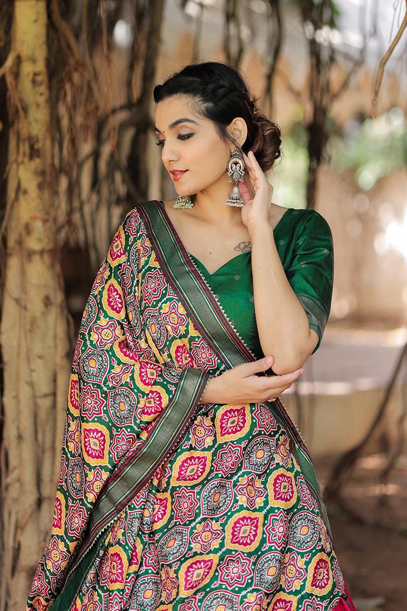 Awesome Pink And Green Printed Dola Silk Lehenga Choli